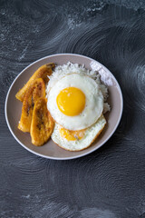 White rice with english fried egg and fried bananas cuban food simple comfort food