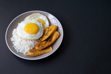 White rice with english fried egg and fried bananas cuban food simple comfort food