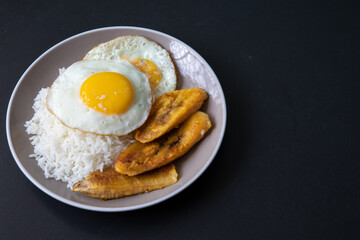 White rice with english fried egg and fried bananas cuban food simple comfort food