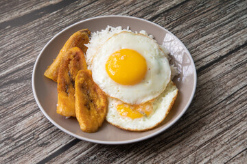 White rice with english fried egg and fried bananas cuban food simple comfort food