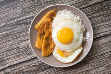 White rice with english fried egg and fried bananas cuban food simple comfort food