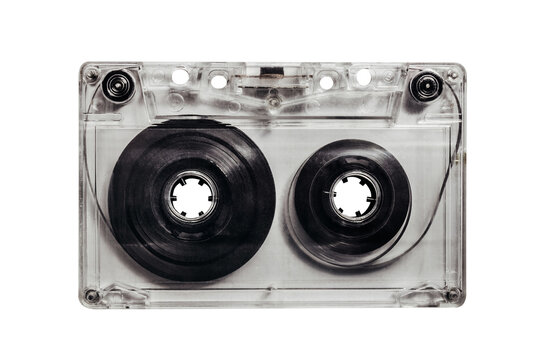 Isolated photo of old fashioned, transparent audio tape cassette on white background.
