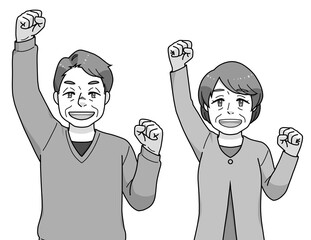 ガッツポーズのシニアの男女