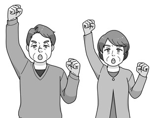 ガッツポーズのシニアの男女