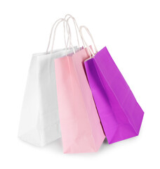 Three paper shopping bags isolated on white