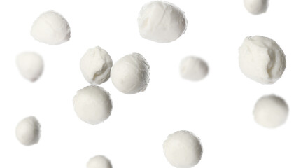 Fresh mozzarella balls falling on white background