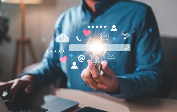 icon, like, media, phone, social, communication, network, business, chat, comment. close up on man hand hold a light bulb with social media marketing icon for internet network technology and business. - Powered by Adobe