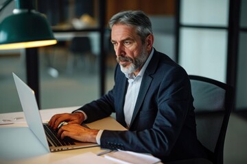 Busy middle aged professional business man working on laptop at office desk. Older serious male entrepreneur typing on computer, executive manager investor analyzing digital financial, Generative AI