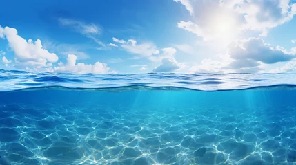 Poster blue sea or ocean water surface and underwater with blue sky © Aura