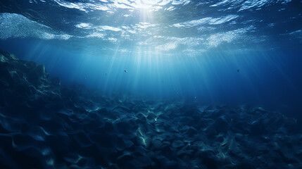 dark blur ocean surface seen from underwater