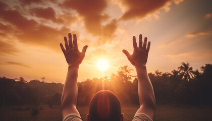 hands open palm up worship to the sky with blur sun rise sky background