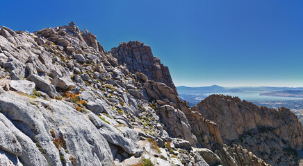 Fototapeta premium Lone Peak and surrounding landscape from Jacob’s Ladder hiking trail, Lone Peak Wilderness, Wasatch Rocky Mountains, Utah, United States.
