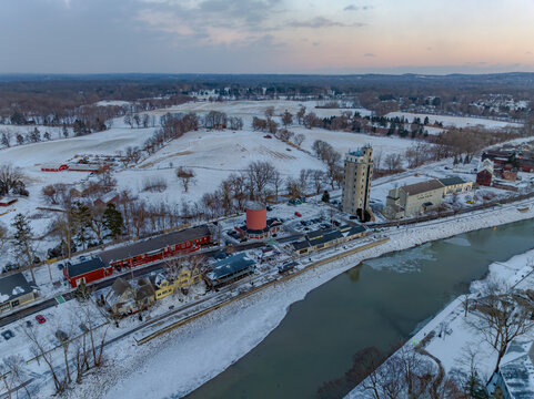 Early evening winter aerial photo of Schoen Place and the Erie Canal in the Village of Pittsford, New York. (01-14-2024)