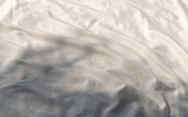 Curtain white wave and soft shadow of palm leaves. abstract background on isolated with shade leaf...
