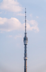 Obraz premium Ostankino TV tower on blue sky, Moscow television and broadcasting tower.