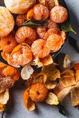 Tangerines with peeled skin on a plate