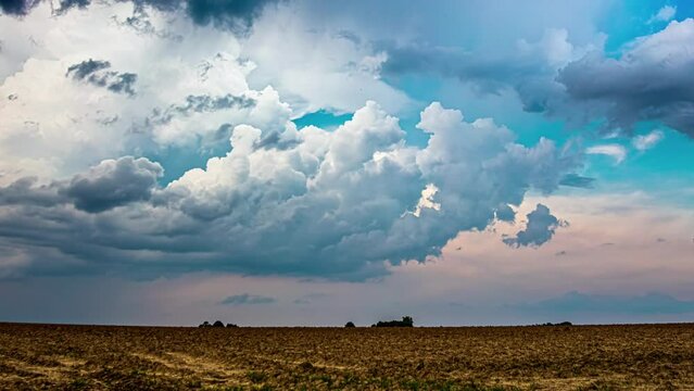 An ominous sky timelapse on an agricultural field