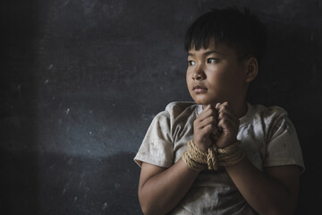 Children who are victims of human trafficking Tied the rope attached to the wrist with stress and...
