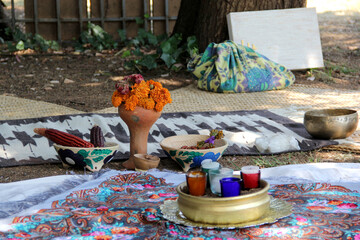 Fototapeta premium Space prepared to do a holistic ceremony with rituals to direct energy in introspection and connection to heal, say goodbye or celebrate