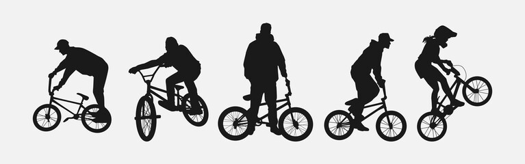 Fototapeta na wymiar Set of silhouettes of BMX cyclist. Isolated on white background. Graphic vector illustration.
