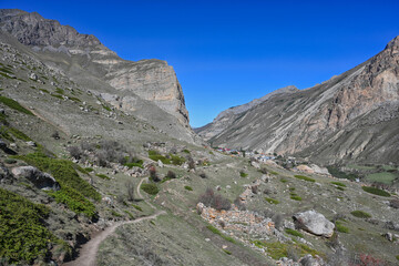 Trail path to the mountain village of Eltyubyu on a sunny day