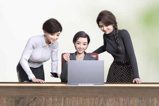 ノートパソコンを見る三人のビジネスウーマン