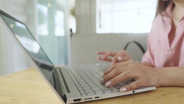 Woman using her laptop