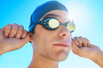 Swimming cap, goggles and sports man ready for exercise, outdoor workout or training for summer...