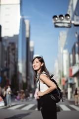 Obraz premium Urban chic, Trendy young lady in Tokyo, radiating positivity and success, showcasing dynamic lifestyle of modern Japanese women.