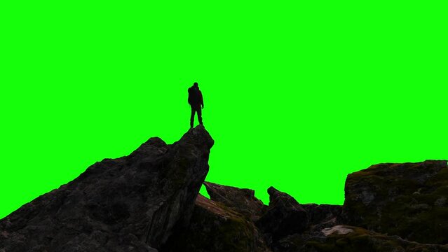Adventure Man Hiker standing on top of Mountain Peak. Composite Cutout with Green Screen Background.