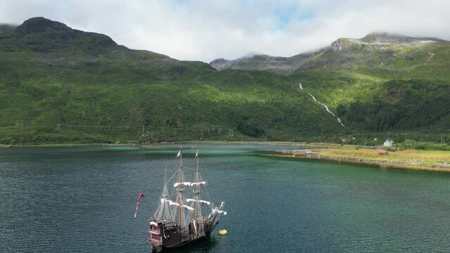 Pirate Ship and Dramatic Nature Landscape in Lofoten Islands, Norway - Aerial 4k