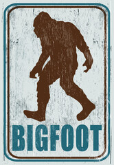 Aged and worn bigfoot sign on wood