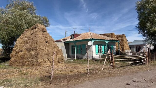 4k static shot captures Georgian countryside and rural life, Samtskhe-Javakheti region, near Paravani Lake. The area is known as Georgian Arctic and has a distinguished architecture.