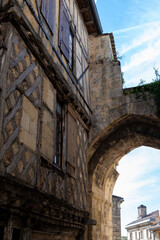 Fototapeta premium Views of old houses and streets of medieval town St. Emilion, production of red Bordeaux wine on cru class vineyards in Saint-Emilion wine making region, France, Bordeaux