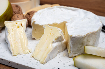French soft Camembert cheese, original Camembert de Normandie, with white mold
