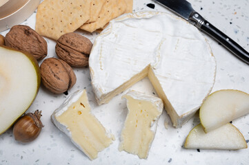 French soft Camembert cheese, original Camembert de Normandie, with white mold