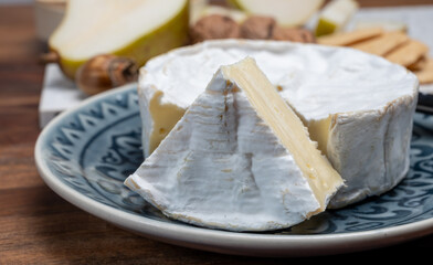 French soft Camembert cheese, original Camembert de Normandie, with white mold