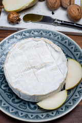 French soft Camembert cheese, original Camembert de Normandie, with white mold