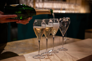 Tasting of sparkling wine champagne on winter weekend festival in December on Avenue de Champagne, Epernay, Champagne region, France © barmalini
