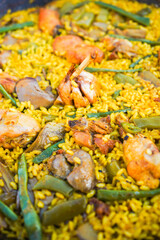  Detailed view of traditional Valencian paella with chicken