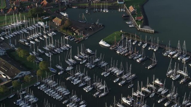 Aerial drone view of harbour of Hindeloopen with sail boats, Friesland, Holland.