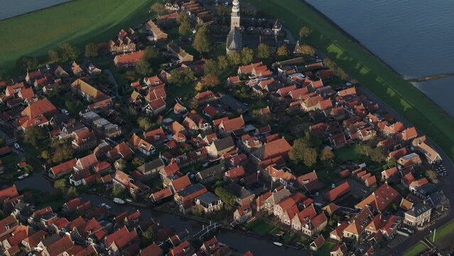Aerial drone view of small village with orange roofs, Hindeloopen, Friesland
