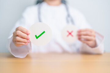 Doctor show Right symbol paper. True and false, accept and rejected, evaluation, Diagnosis, Vote,...