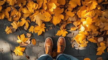  a person standing in front of a bunch of leaves with their feet propped up on the ground with their shoes on.