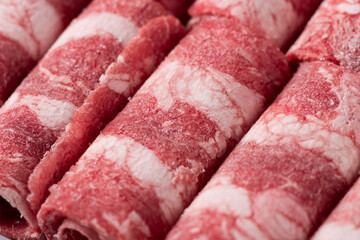Slice of the fresh raw beef  or Beef rolls for shabu