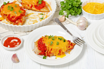 baked juicy chicken breasts with tomatoes, cheese
