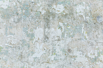 Ragged old gray concrete wall. Construction and repair. Background. Space for text.