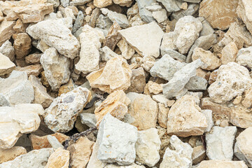 A pile of stones. Construction and repair. Background. Space for text.