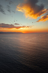 Beautiful sunset view as seen from Los Muertos Beach Pier in the sky.