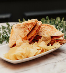 Hot ham and cheese sandwich, toasted with butter on bread